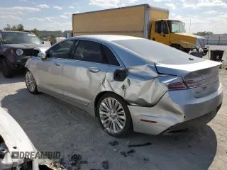 2013 Lincoln MKZ с VIN 3LN6L2J92DR817868, выставлен на аукционе Copart как лот 68264653 с пробегом Не указан миль и Списание • Salvage title. История ставок и продаж доступна на DreamBid. Изображение 2.