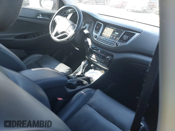 2016 Hyundai Tucson Limited with VIN KM8J33A26GU075023, listed as a IAAI auction lot 41656851 with 125,277 mi miles and . Bid and sale history available at DreamBid. Image 5.