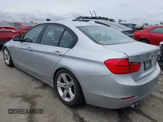 2014 BMW 3 Series 328i with VIN WBA3C1C53EK109613, listed as a IAAI auction lot 41713060 with 141,240 mi miles. Bid and sale history available at carsss.com. Image 3.