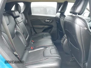 2019 Jeep Cherokee Trailhawk with VIN 1C4PJMBX0KD141577, listed as a IAAI auction lot 42413454 with 122,386 mi miles and . Bid and sale history available at DreamBid. Image 8.