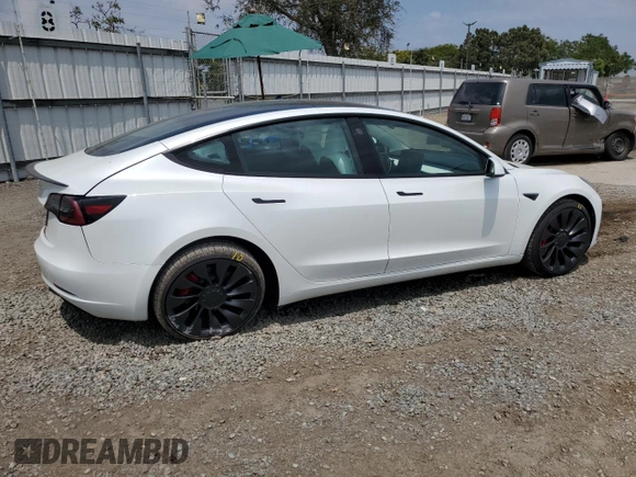 2023 Tesla Model 3 Performance with VIN 5YJ3E1EC5PF487845, listed as a Copart auction lot 62686164 with 4,938 mi miles and Salvage Title. Bid and sale history available at carsss.com. Image 3.