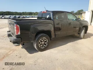2021 GMC Canyon 4WD AT4 w/Cloth with VIN 1GTG6FEN1M1295551, listed as a Copart auction lot 74900294 with 39,853 mi miles and Salvage Title. Bid and sale history available at carsss.com. Image 3.