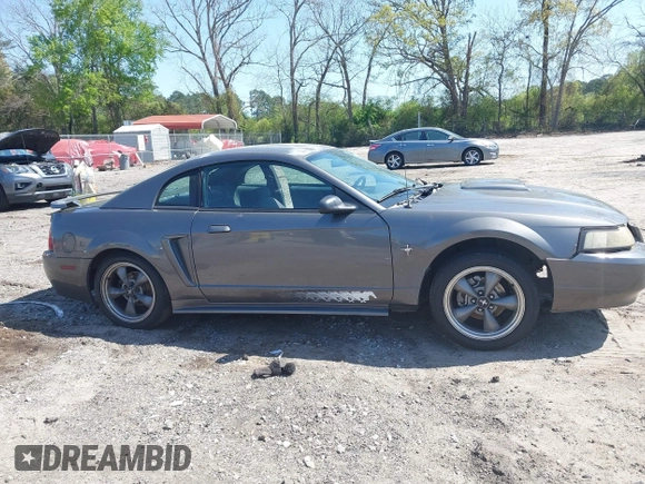 2003 Ford Mustang Standard z VIN 1FAFP40463F327753, wystawiony jako IAAI lot #42005257 z przebiegiem 325 449 mil mil oraz . Historia ofert i sprzedaży dostępna na DreamBid. Obrazek 14.