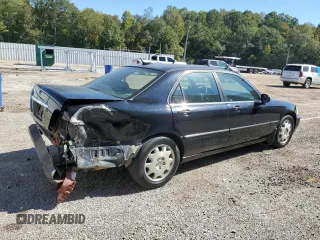 2004 Acura RL w/Navigation System with VIN JH4KA96624C004656, listed as a Copart auction lot 77021014 with 158,857 mi miles and Salvage Title. Bid and sale history available at carsss.com. Image 3.