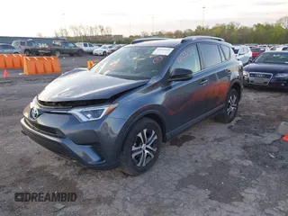 2016 Toyota RAV4 LE with VIN JTMBFREV1GD187414, listed as a IAAI auction lot 42033130 with 123,955 mi miles and . Bid and sale history available at carsss.com. Image 2.