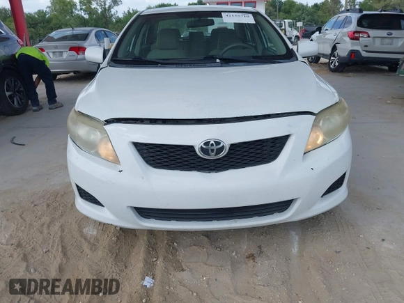 2010 Toyota Corolla with VIN 1NXBU4EE0AZ335239, listed as a IAAI auction lot 42155710 with 215,134 mi miles. Bid and sale history available at carsss.com. Image 6.