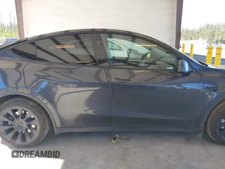 2024 Tesla Model Y Long Range z VIN 7SAYGAEE8RF088791, wystawiony jako IAAI lot #42185399 z przebiegiem 15 339 mil mil oraz . Historia ofert i sprzedaży dostępna na DreamBid. Obrazek 13.