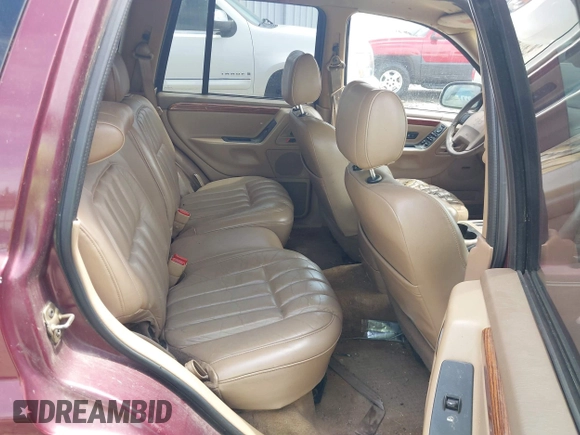 1999 Jeep Grand Cherokee Limited with VIN 1J4G268S5XC529951, listed as a IAAI auction lot 42317713 with 188,001 mi miles and . Bid and sale history available at DreamBid. Image 8.