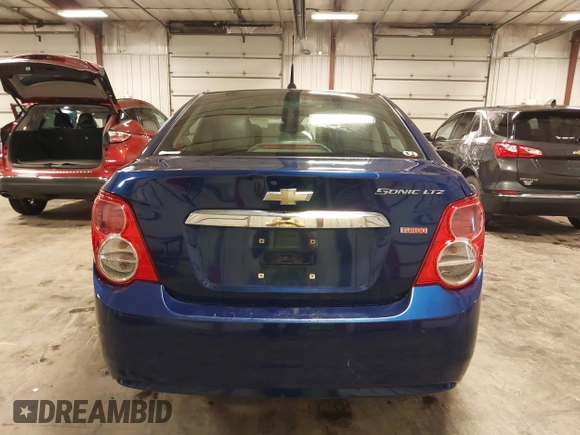 2012 Chevrolet Sonic LTZ z VIN 1G1JE5SB4C4214450, wystawiony jako IAAI lot #42207345 z przebiegiem 120 152 mil mil oraz . Historia ofert i sprzedaży dostępna na DreamBid. Obrazek 17.