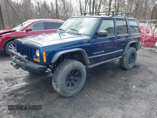 2000 Jeep Cherokee Classic with VIN 1J4FF58SXYL163514, listed as a IAAI auction lot 41920054 with 259,677 mi miles. Bid and sale history available at carsss.com. Image 2.