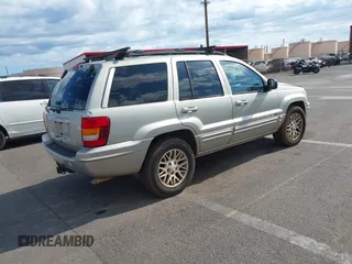 2004 Jeep Grand Cherokee Limited with VIN 1J4GW58N54C299669, listed as a IAAI auction lot 42369745 with 90,240 mi miles and . Bid and sale history available at DreamBid. Image 4.