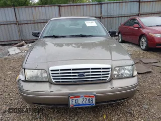 2004 Ford Crown Victoria LX с VIN 2FAFP74W74X114961, выставлен на аукционе IAAI как лот 42347867 с пробегом 170 867 миль миль и . История ставок и продаж доступна на DreamBid. Изображение 12.