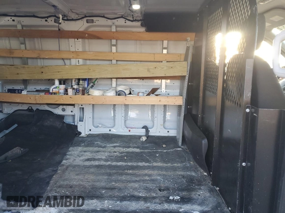 2019 Ford Transit z VIN 1FTYR1YM7KKB51124, wystawiony jako Copart lot #82111974 z przebiegiem 93 581 mil mil oraz Szkoda całkowita • Salvage title. Historia ofert i sprzedaży dostępna na DreamBid. Obrazek 11.