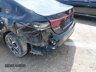 2021 Kia Forte LXS z VIN 3KPF24AD7ME393313, wystawiony jako IAAI lot #42127977 z przebiegiem 44 943 mil mil oraz . Historia ofert i sprzedaży dostępna na DreamBid. Obrazek 6.