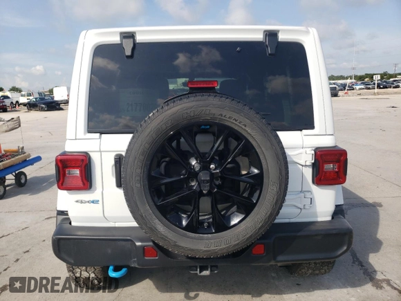 2022 Jeep Wrangler Unlimited Sahara z VIN 1C4JJXP68NW171569, wystawiony jako Copart lot #58955445 z przebiegiem Nie podano mil oraz Szkoda całkowita • Salvage title. Historia ofert i sprzedaży dostępna na DreamBid. Obrazek 6.