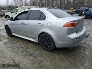 2013 Mitsubishi Lancer SE with VIN JA32V2FW5DU015043, listed as a Copart auction lot 85255194 with 133,654 mi miles and Salvage Title. Bid and sale history available at carsss.com. Image 2.