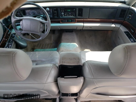 1999 Buick LeSabre Limited with VIN 1G4HR52K2XH469117, listed as a Copart auction lot 61813585 with 149,090 mi miles and Salvage title. Bid and sale history available at DreamBid. Image 8.
