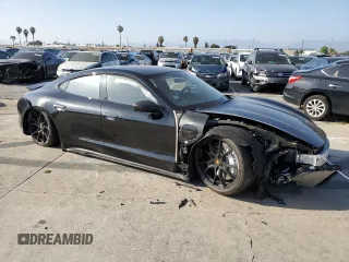 2022 Porsche Taycan GTS with VIN WP0AD2Y10NSA59551, listed as a Copart auction lot 36894013 with 5,593 mi miles and . Bid and sale history available at DreamBid. Image 4.