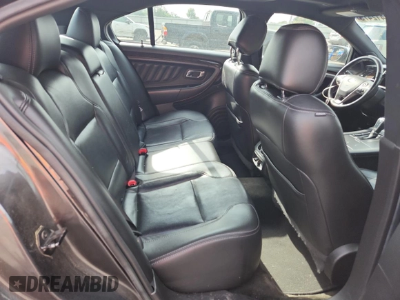 2016 Ford Taurus Limited z VIN 1FAHP2F87GG125043, wystawiony jako Copart lot #60412475 z przebiegiem 158 919 mil mil oraz Czysty tytuł • Clean title. Historia ofert i sprzedaży dostępna na DreamBid. Obrazek 10.