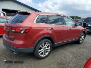 2013 Mazda CX-9 Grand Touring z VIN JM3TB3DV0D0409448, wystawiony jako Copart lot #57339435 z przebiegiem 146 366 mil mil oraz Czysty tytuł • Clean title. Historia ofert i sprzedaży dostępna na DreamBid. Obrazek 3.