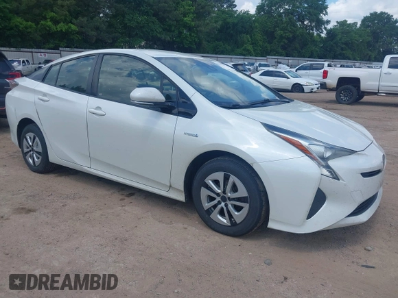 2017 Toyota Prius Two with VIN JTDKARFUXH3040780, listed as a IAAI auction lot 42091493 with 105,952 mi miles and . Bid and sale history available at DreamBid. Image 1.