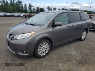 2015 Toyota Sienna Limited with VIN 5TDDK3DC4FS096402, listed as a Copart auction lot 59306665 with 117,012 mi miles and Salvage title. Bid and sale history available at DreamBid. Image 1.