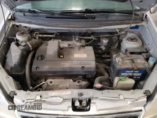 2005 Suzuki Aerio SX z VIN JS2RC61H555300879, wystawiony jako Copart lot #80481084 z przebiegiem 129 196 mil mil oraz Szkody całkowita. Historia ofert i sprzedaży dostępna na DreamBid. Obrazek 13.