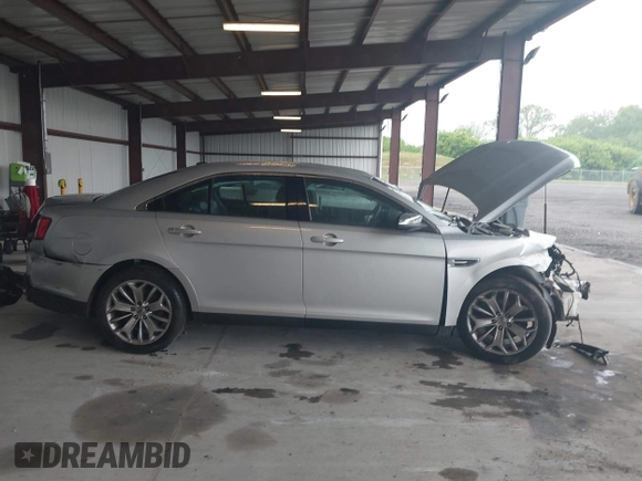 2014 Ford Taurus Limited с VIN 1FAHP2F89EG186147, выставлен на аукционе IAAI как лот 42228000 с пробегом 179 863 миль миль и . История ставок и продаж доступна на DreamBid. Изображение 14.