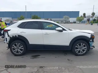 2023 Mazda CX-30 S Carbon Edition with VIN 3MVDMBCM0PM569100, listed as a IAAI auction lot 41978191 with 20,470 mi miles and . Bid and sale history available at DreamBid. Image 14.
