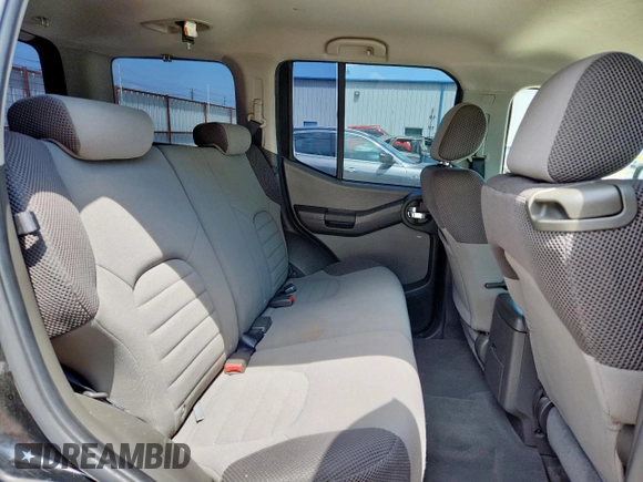 2007 Nissan Xterra SE z VIN 5N1AN08U07C505909, wystawiony jako Copart lot #59867365 z przebiegiem 128 097 mil mil oraz Szkoda całkowita • Salvage title. Historia ofert i sprzedaży dostępna na DreamBid. Obrazek 11.