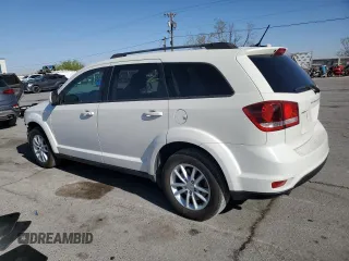 2017 Dodge Journey SXT with VIN 3C4PDCBG7HT531547, listed as a Copart auction lot 52322685 with 121,876 mi miles and Salvage title. Bid and sale history available at DreamBid. Image 2.