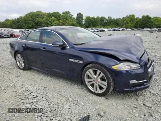 2017 Jaguar XJ R-Sport with VIN SAJWA1C70H8W05558, listed as a Copart auction lot 59759165 with 102,230 mi miles and Salvage title. Bid and sale history available at DreamBid. Image 4.