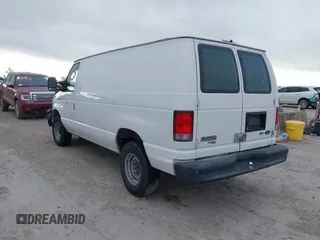 2013 Ford Econoline Cargo Commercial with VIN 1FTNE2EW9DDB02704, listed as a IAAI auction lot 42596289 with 243,629 mi miles and . Bid and sale history available at DreamBid. Image 3.