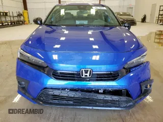 2022 Honda Civic Sport z VIN 2HGFE2F51NH598386, wystawiony jako Copart lot #57687225 z przebiegiem 19 204 mil mil oraz Czysty tytuł • Clean title. Historia ofert i sprzedaży dostępna na DreamBid. Obrazek 5.