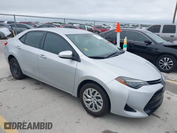 2018 Toyota Corolla L z VIN 5YFBURHE7JP822870, wystawiony jako IAAI lot #42318344 z przebiegiem 118 519 mil mil oraz . Historia ofert i sprzedaży dostępna na DreamBid. Obrazek 1.