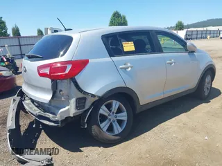 2013 Kia Sportage LX with VIN KNDPBCA24D7352828, listed as a IAAI auction lot 42685744 with 156,805 mi miles and . Bid and sale history available at DreamBid. Image 4.