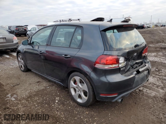 2010 Volkswagen GTI with VIN WVWHV7AJ2AW400192, listed as a Copart auction lot 86180024 with 124,705 mi miles and Salvage Title. Bid and sale history available at carsss.com. Image 2.