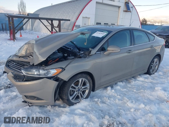 2016 Ford Fusion SE Hybrid with VIN 3FA6P0LU8GR127311, listed as a IAAI auction lot 41242945 with 1 mi miles. Bid and sale history available at carsss.com. Image 18.