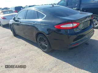 2014 Ford Fusion SE with VIN 3FA6P0HD4ER390773, listed as a IAAI auction lot 42088373 with 265,001 mi miles and . Bid and sale history available at DreamBid. Image 3.