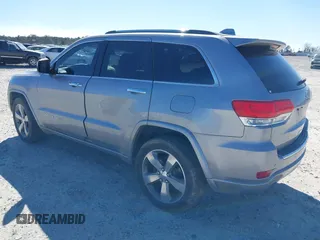 2014 Jeep Grand Cherokee Overland with VIN 1C4RJECG9EC206787, listed as a IAAI auction lot 41730875 with 194,196 mi miles. Bid and sale history available at carsss.com. Image 3.