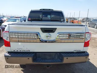 2017 Nissan Titan SV with VIN 1N6AA1E5XHN532587, listed as a IAAI auction lot 42019155 with 90,496 mi miles and . Bid and sale history available at DreamBid. Image 16.