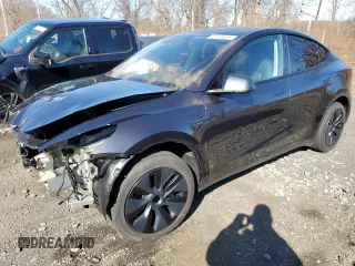 2025 Tesla Model Y Long Range with VIN 7SAYGAEE1SF218433, listed as a Copart auction lot 49768345 with 6,940 mi miles and Salvage Title. Bid and sale history available at carsss.com. Image 1.