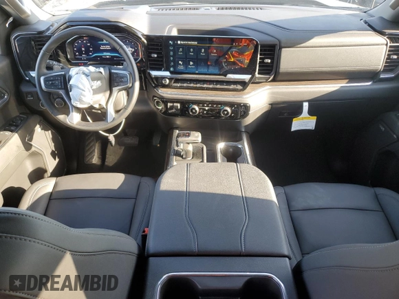 2025 Chevrolet Silverado 1500 with VIN 3GCUKFE80SG128699, listed as a Copart auction lot 52393645 with 5,759 mi miles and Salvage Title. Bid and sale history available at DreamBid. Image 8.