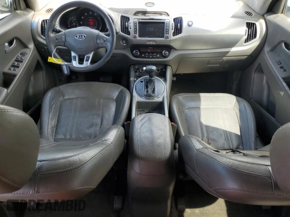 2012 Kia Sportage EX with VIN KNDPCCA2XC7252292, listed as a Copart auction lot 56975535 with 160,445 mi miles and Salvage title. Bid and sale history available at DreamBid. Image 8.