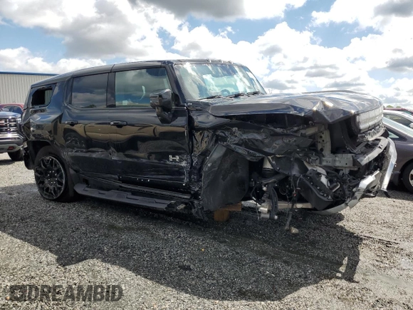 2024 GMC Hummer EV 2X with VIN 1GKB0NDE0RU109550, listed as a Copart auction lot 52746425 with 5,426 mi miles and Salvage Title. Bid and sale history available at carsss.com. Image 4.