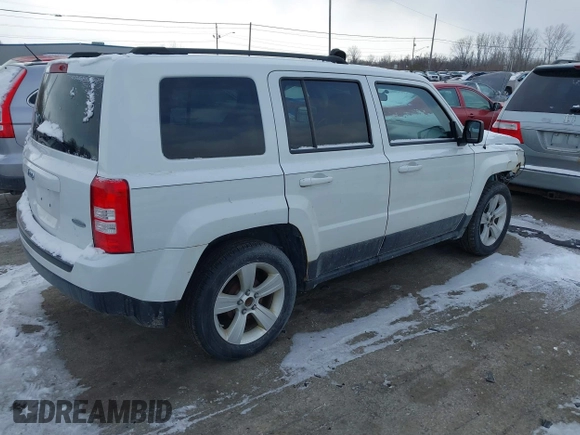 2014 Jeep Patriot Latitude with VIN 1C4NJPFA6ED502457, listed as a IAAI auction lot 41334385 with 160,600 mi miles and . Bid and sale history available at carsss.com. Image 4.