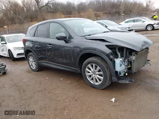 2016 Mazda CX-5 Touring with VIN JM3KE4CY7G0715507, listed as a IAAI auction lot 41699610 with 108,206 mi miles. Bid and sale history available at carsss.com. Image 1.
