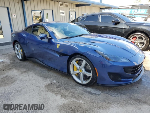 2019 Ferrari Portofino z VIN ZFF89FPAXK0242549, wystawiony jako Copart lot #74454234 z przebiegiem Nie podano mil oraz Nie do naprawy. Historia ofert i sprzedaży dostępna na DreamBid. Obrazek 4.