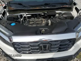 2023 Honda Passport EX-L with VIN 5FNYF8H58PB024039, listed as a Copart auction lot 57269725 with 44,705 mi miles and Salvage title. Bid and sale history available at DreamBid. Image 12.