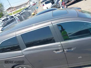 2013 Honda Odyssey EX-L with VIN 5FNRL5H65DB011071, listed as a IAAI auction lot 41992265 with 192,624 mi miles and . Bid and sale history available at DreamBid. Image 13.